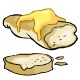 A freshly baked baguette smothered with butter then lightly toasted.