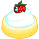Shortcake base with a generous helping of whipped cream topped with a big fresh strawberry.