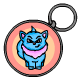 This keyring is a peachy colour and it has a pretty blue Wocky on it.