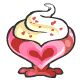 A strawberry fondant in the shape of a heart topped with whipped cream.