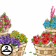 A pretty selection of flowers arranged in matching baskets.
